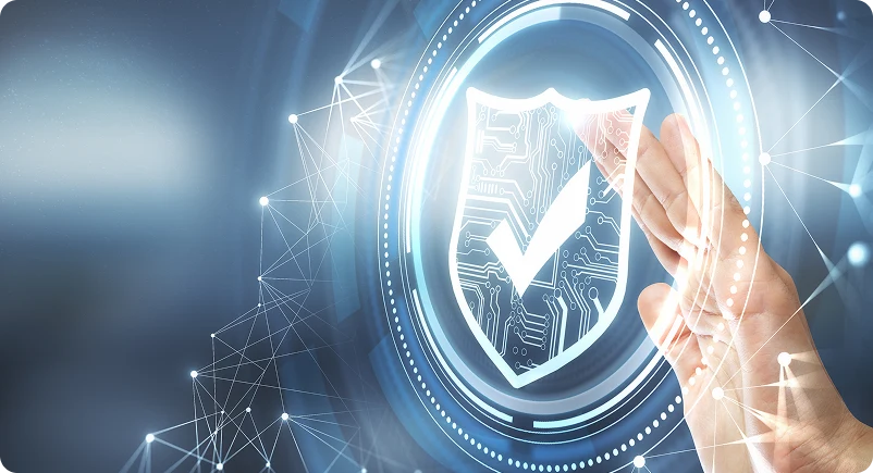 A hand reaches toward a digital shield with a checkmark, symbolizing security. Surrounded by network lines, it conveys technology and protection.