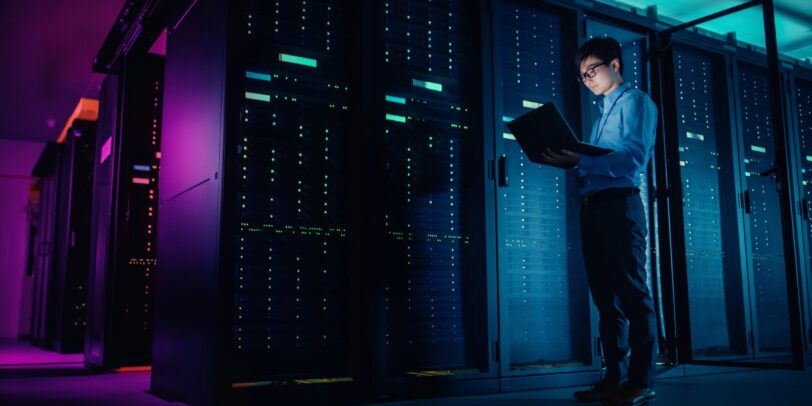 Glowing blue digital padlock icon composed of network connections and circuit lines.